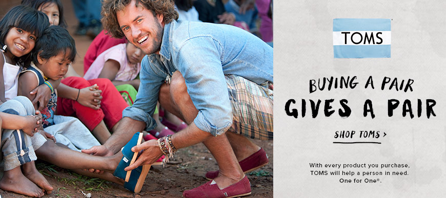 Image representing TOMS 'One for One' initiative, possibly showing shoes being given to children.